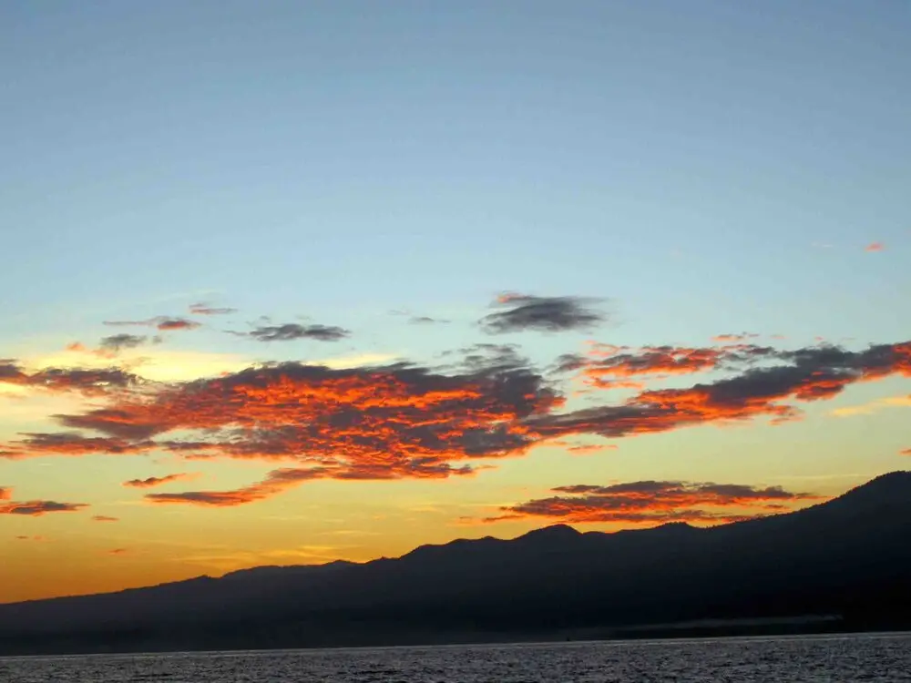 Sunrise colours spreading over the caldera