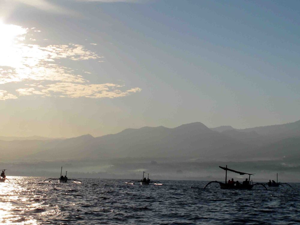 First light reflected on Lake Batur