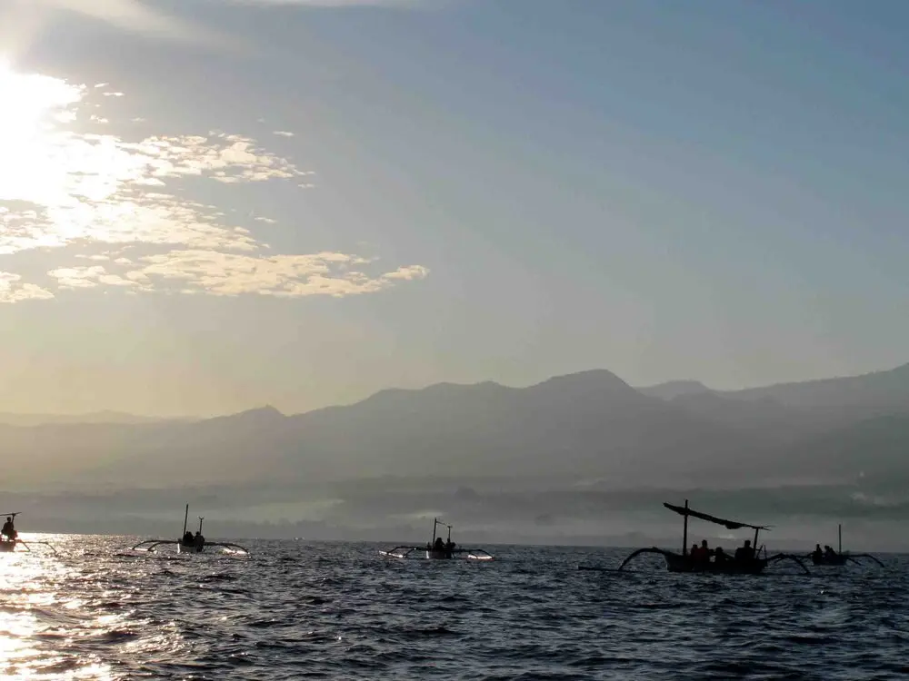 First light reflected on Lake Batur