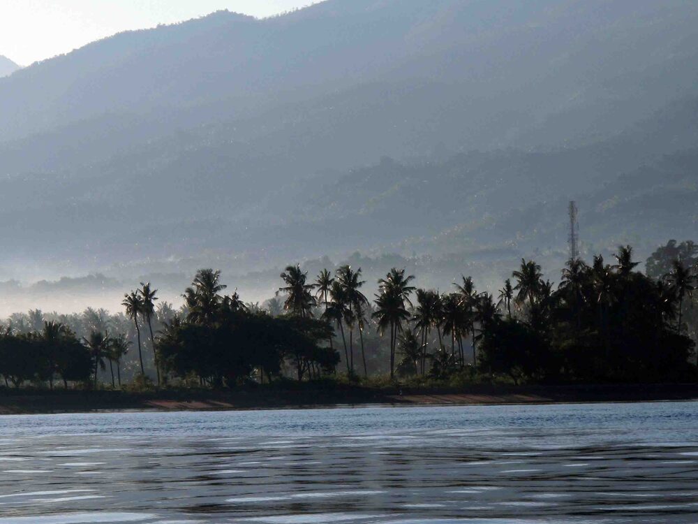 Morning mist drifting across the mountains